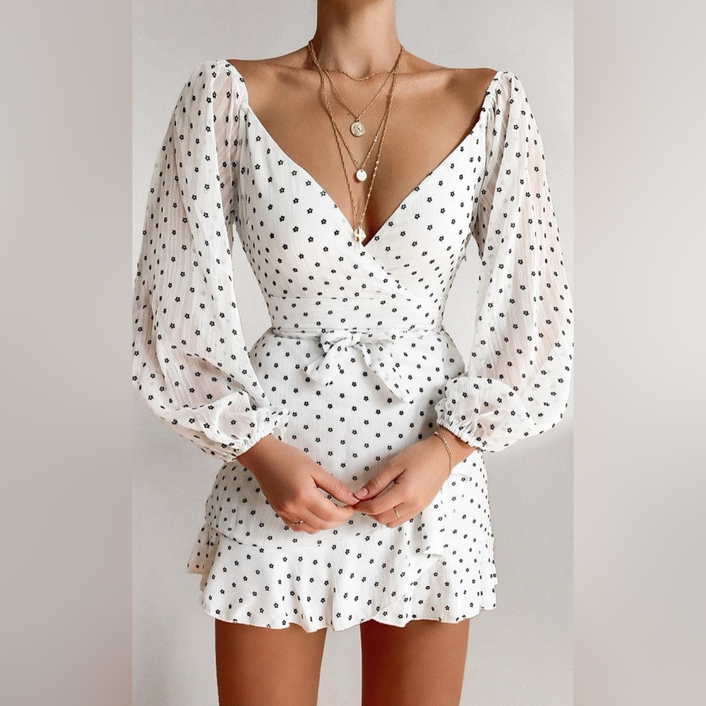 SHOWPO YOU ARE SUCH A DREAM DRESS IN WHITE FLOCKED SPOT